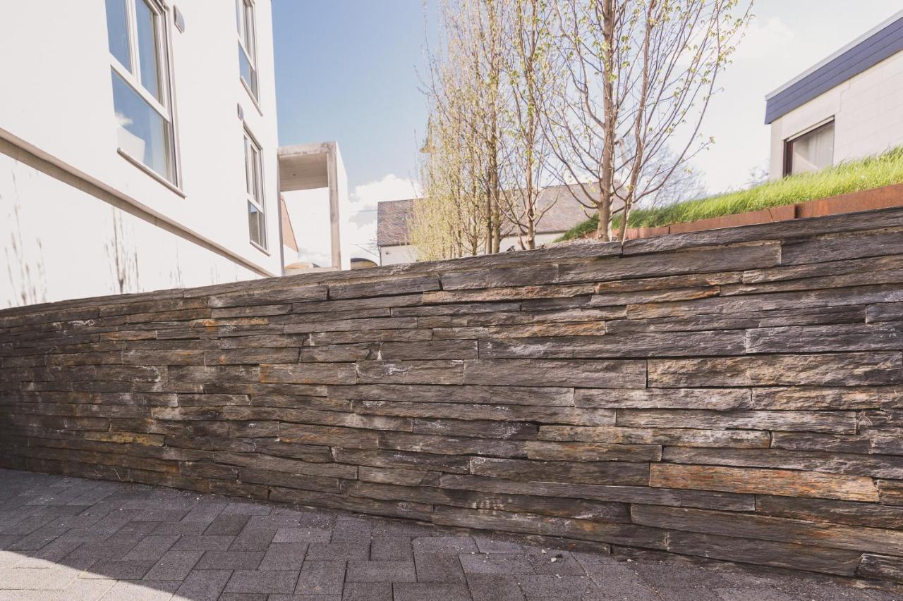 Steillage - Design Moselsuiten Mit Panoramablick Und Spa Brauneberg Eksteriør billede